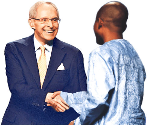 Sri Harold Klemp shaking hands with someone