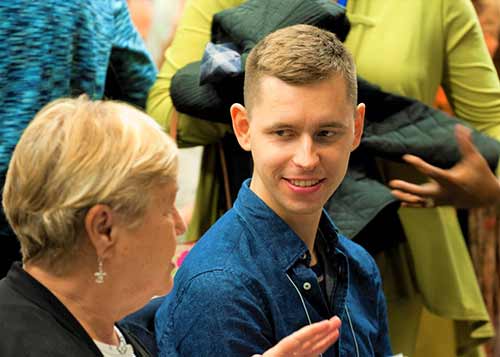 Two people interacting at an Eckankar event