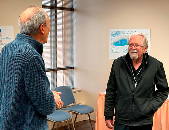 Sri Doug Kunin greeting Dr. Gordon Melton